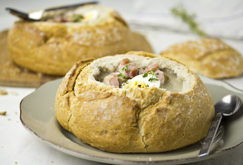 Zurek polish rye soup served in loaf of bread
