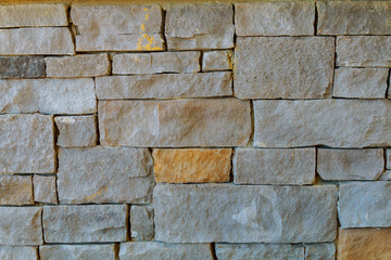 Ancient antique stone wall of Building facade.