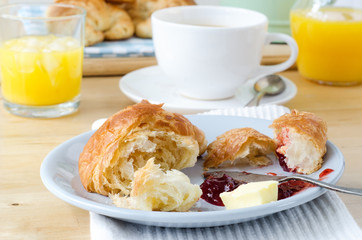 Continental Breakfast Setting on Wooden Table