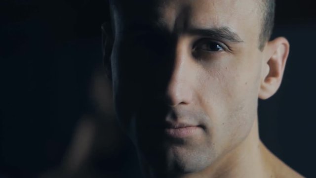 Close up Portrait of Man Boxer at Boxing Club