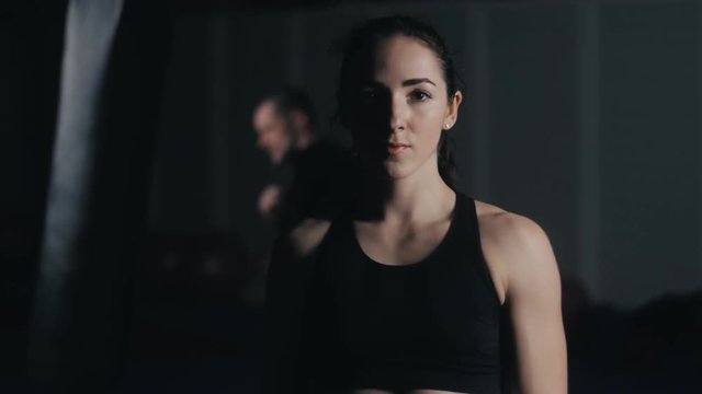 Portrait of an athlete young woman in fitness studio