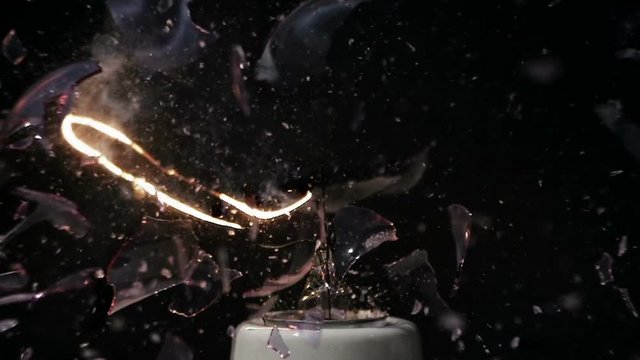 Small Transparent Bulb Exploding When Shattered Slow Motion 2000fps
