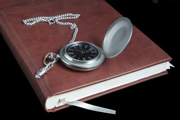 Pocket watch on diary page - 140729734