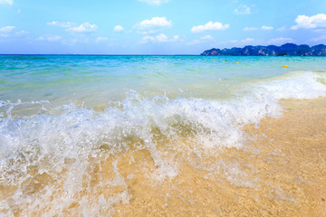 Fototapeta premium wave of the sea on sand beach