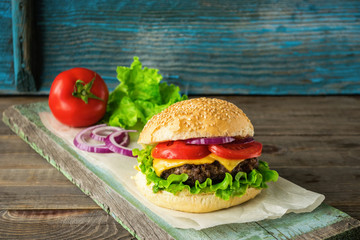 The traditional hamburger Patty, cheese, tomato, lettuce, beef Burger, takeaway