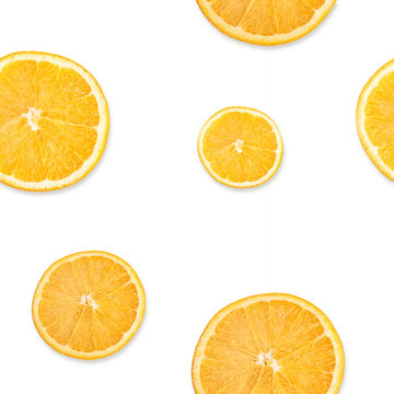 Slices of citrus, lemon, orange wedges seamless pattern isolated on a white background. Top view