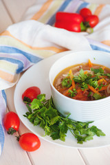 Asian traditional soup lagman with noodle and meat