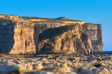 Gozo island on Malta, closeup on coastline of Dweira cliffs