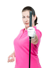 athlete shows a golf club at the camera on a white background