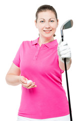 Woman golfer holding a stick and a ball on a white background