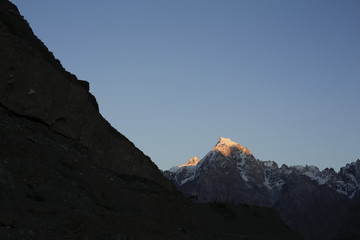 Sunset light on mountain peaks. Sost, Gojal Valley, Gilgit-Baltistan, Pakistan.