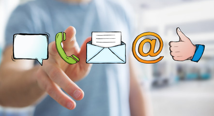 Businessman touching manuscript contact icon with his finger