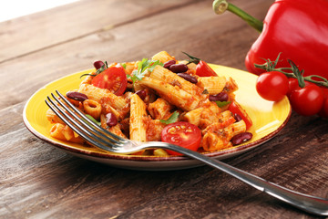 chilli con carne and penne with tomato kidney beans
