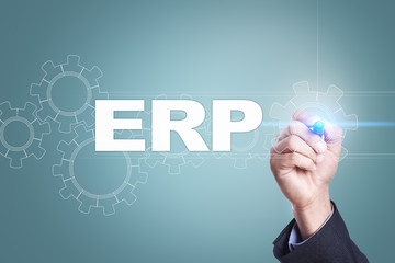 Businessman drawing on virtual screen. erp concept.