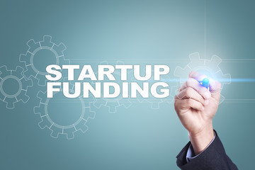Businessman drawing on virtual screen. startup funding concept.