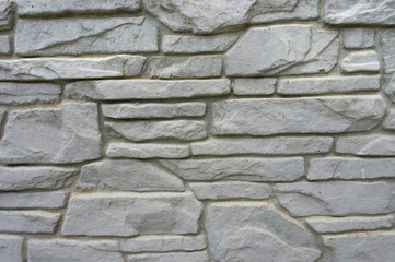 Texture of grey stone as background close up