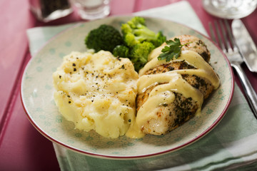 Creamy italian chicken with mashed potatoes and broccoli