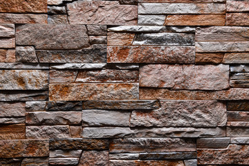 Stone grey brown orange wall texture background natural color