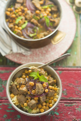 Moroccan spiced lamb with chickpeas and red onion