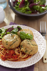 Meatless meatballs made from bread with cheese centre and spaghetti