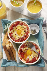 Baked egg with tomato pancetta and cheese