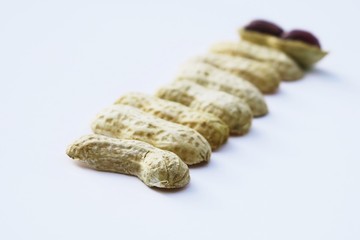 Pile of peanuts isolated on white background