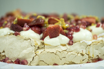 strawberry,pomegranate and passionfruit pavlova