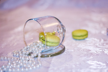Macarons dessert in a glass plate for lemon with pearls