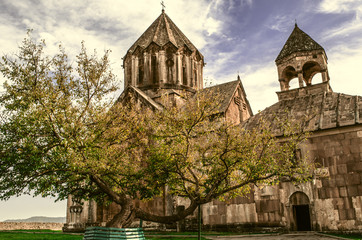 Monastery of St.John the Baptist in Gandzasar and old mulberry tree in the courtyard