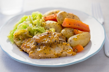 Pork loin with potato, carrot and savoy cabbage