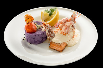 salmon fillet with champagne sauce and purple potatoes