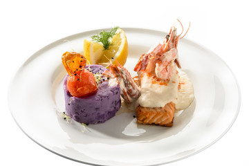 salmon fillet with champagne sauce and purple potatoes