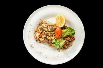 pork brain with herb and lemon on the plate