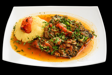 Brine fish with tomato and vegetable sauce