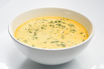 Tripe soup in a white bowl