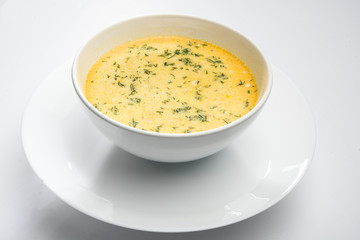 Tripe soup in a white bowl
