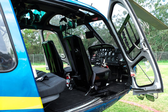Helicopter interior with open door and operating console