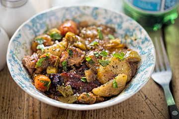 Slow cooked lamb shoulder with carrot, leek and potato