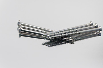 screws on metal background