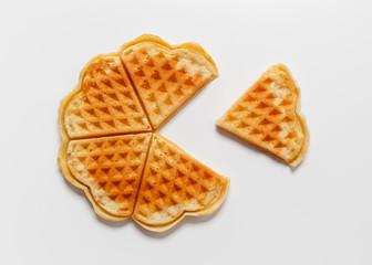 Belgian heart shaped waffle on white background