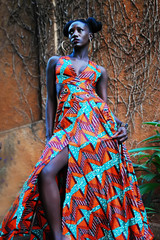 Young African girl in modern African print dress