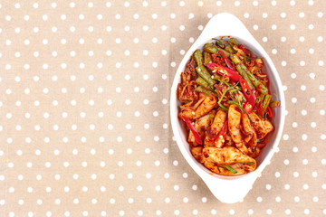 Spicy fried cowpea and squid with roasted chile paste.