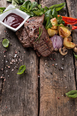 Beef steak on woode table, Fresh grilled steak with vegetable