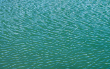 Water surface background,Italy,11 March 2017,abstract background light ripples on the surface,sea water