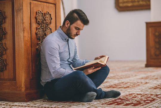 Smart Muslim student reading