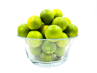 Fresh limes isolated on white background