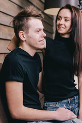 Happy couple hugging at home