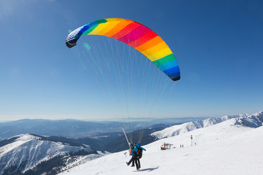 paragliding on skis, winter holiday activity, Chopok, Slovakia