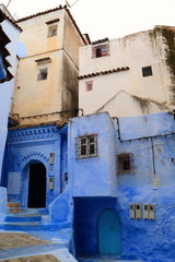 Fototapeta na wymiar Detail of a street in the village of Chefchaouen in Morocco, a fantastic destination for a holiday