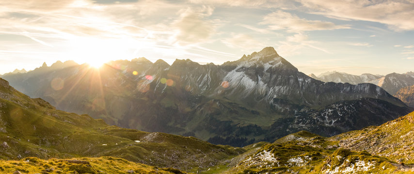 Amazing sunrise in the mountains. Nice lens flares and sunbeams